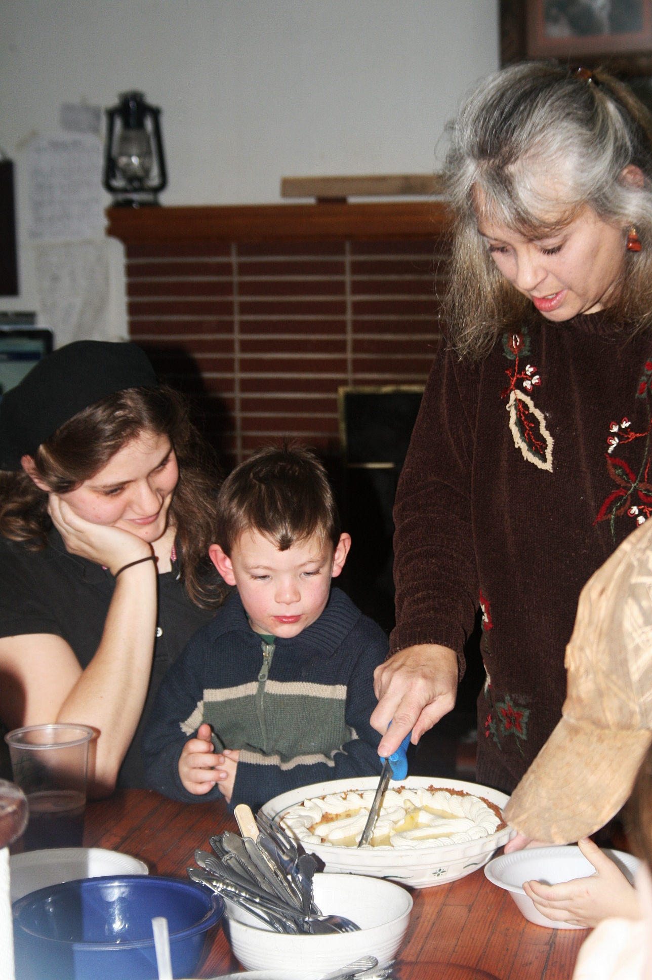 The cutting of Kitty's "cake." (It's actually Key Lime Pie):D 