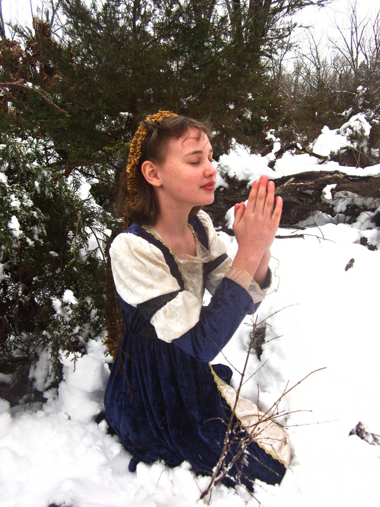 Princess Adelina earnestly beseeching her Lord in prayer. 