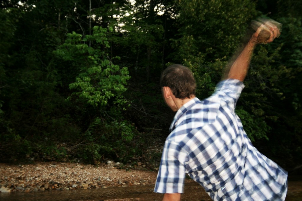 While others threw  rocks across the water seeing how wet they can get their opponents. 