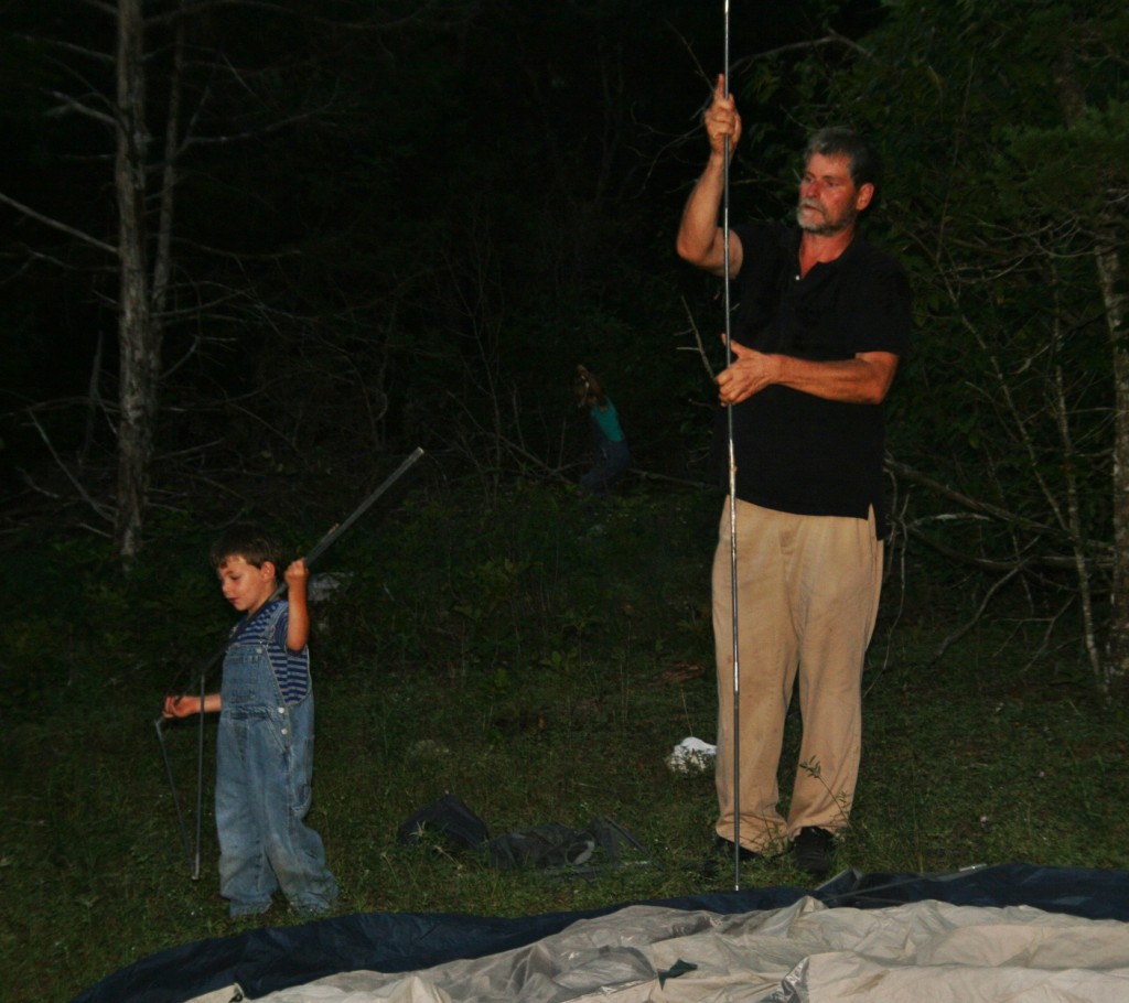 Helping Daddy set up camp! :) 