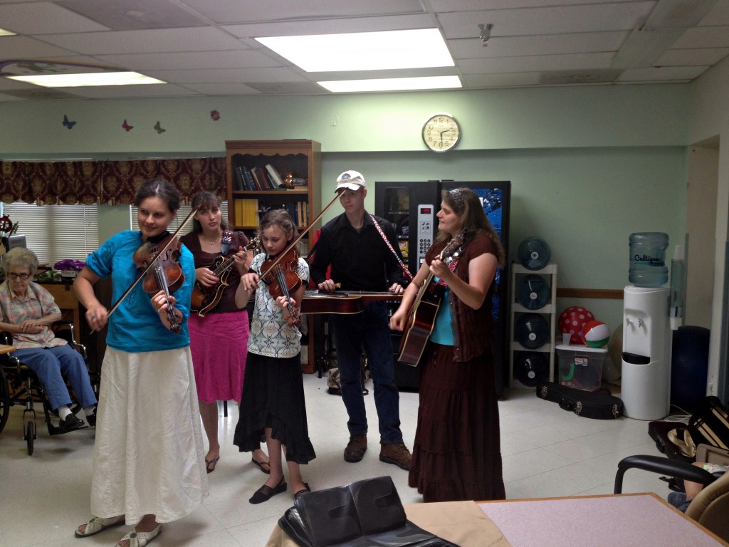 Singing at the nursing homes. 