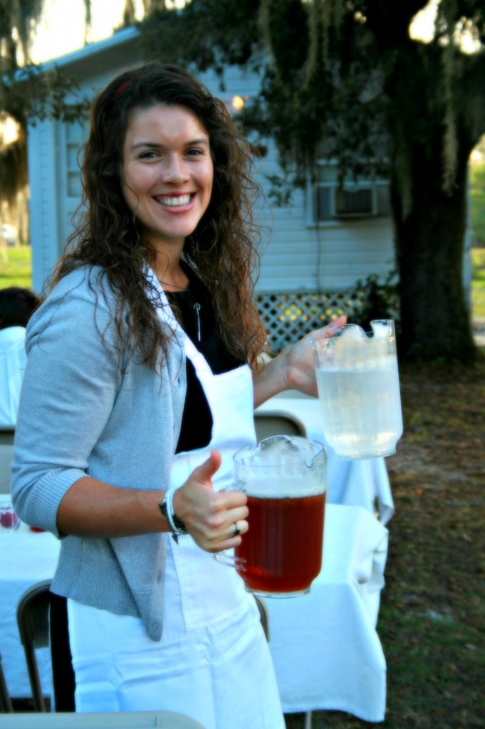 Sweet Olivia helps with the drink table! 