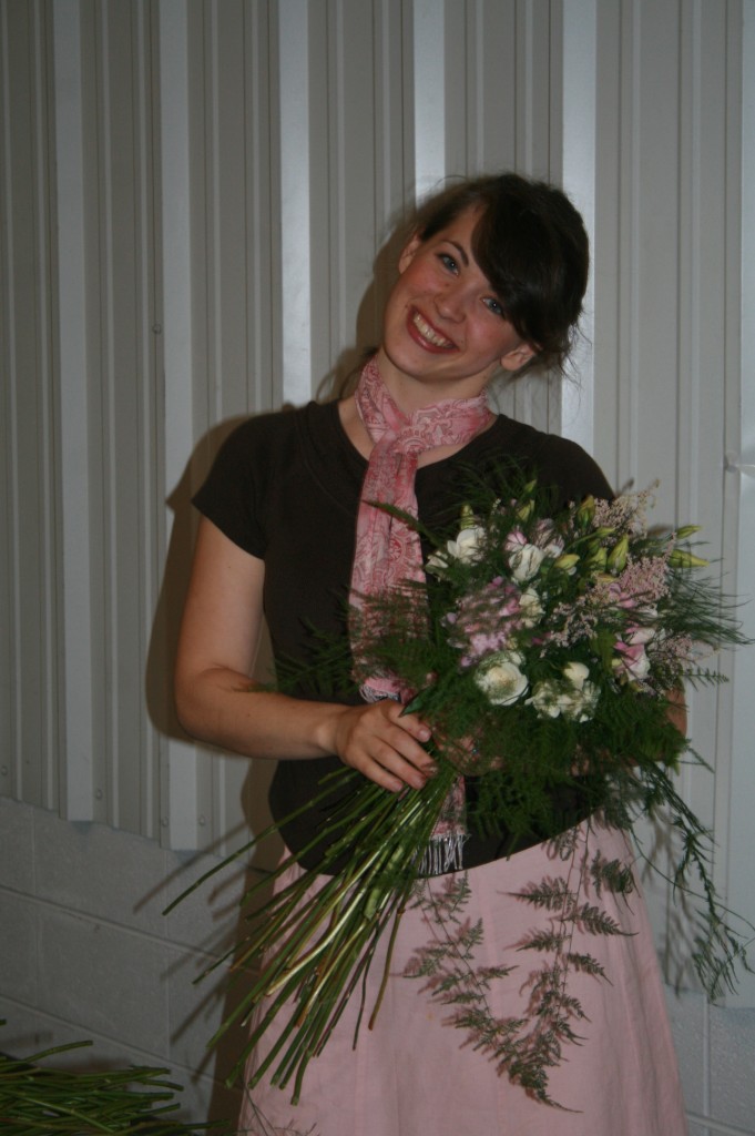 The Bride builds her bouquet. 