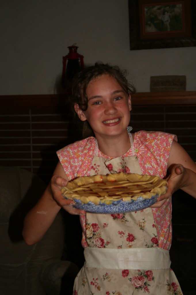 Rose poses for the camera before her masterpiece is destroyed by those who would wish it devoured. 