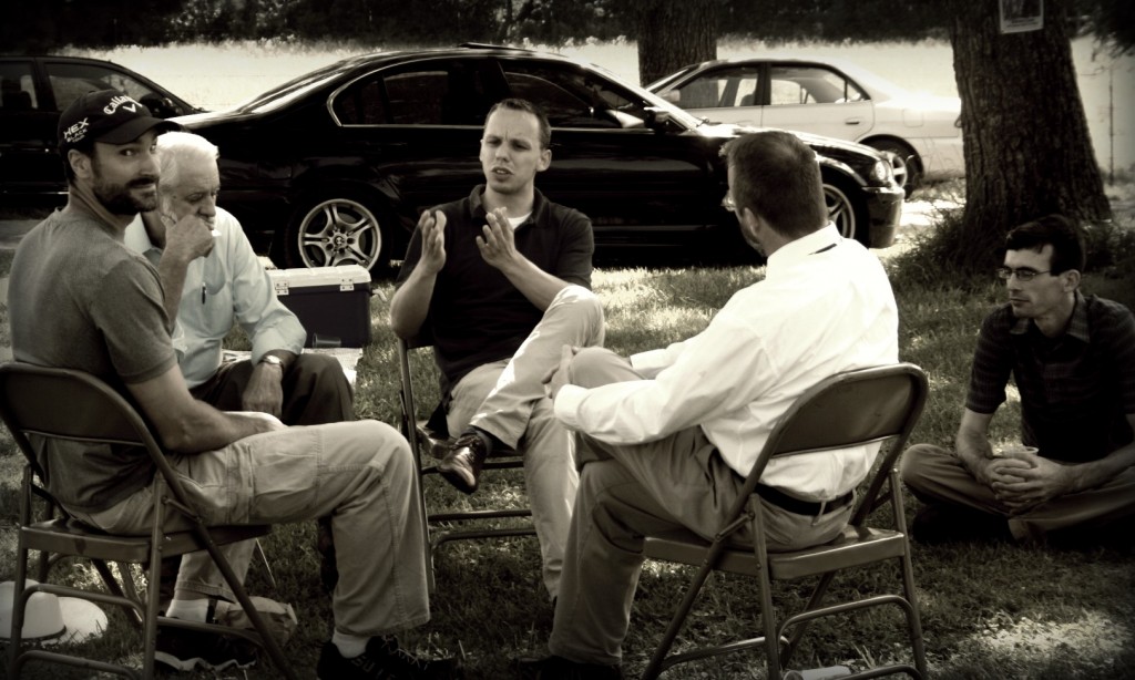 The Pastors gather and talk.